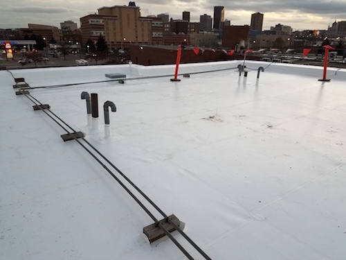 White roofing membrane used on a commercial building