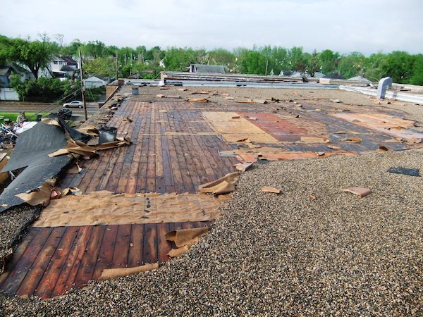 Storm damage on the roof of a commercial building