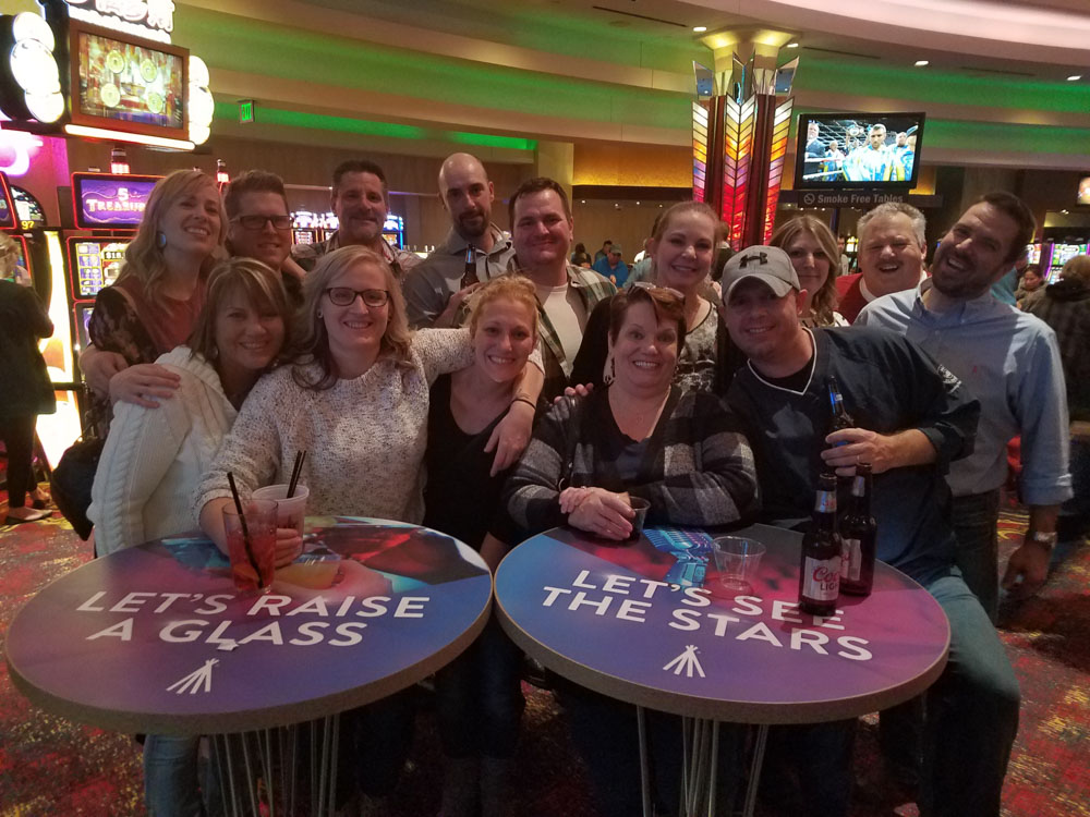 Our roofing crew celebrating after work together