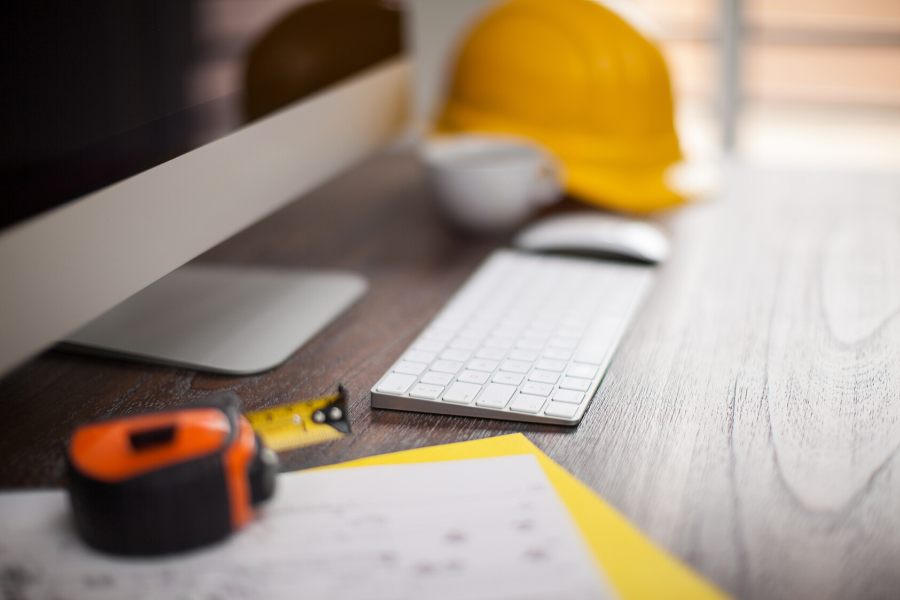 a tape measure laid next to a workstation