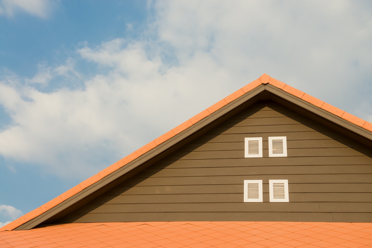 Sun rays directly on residential roof, causing heat damage to shingles.