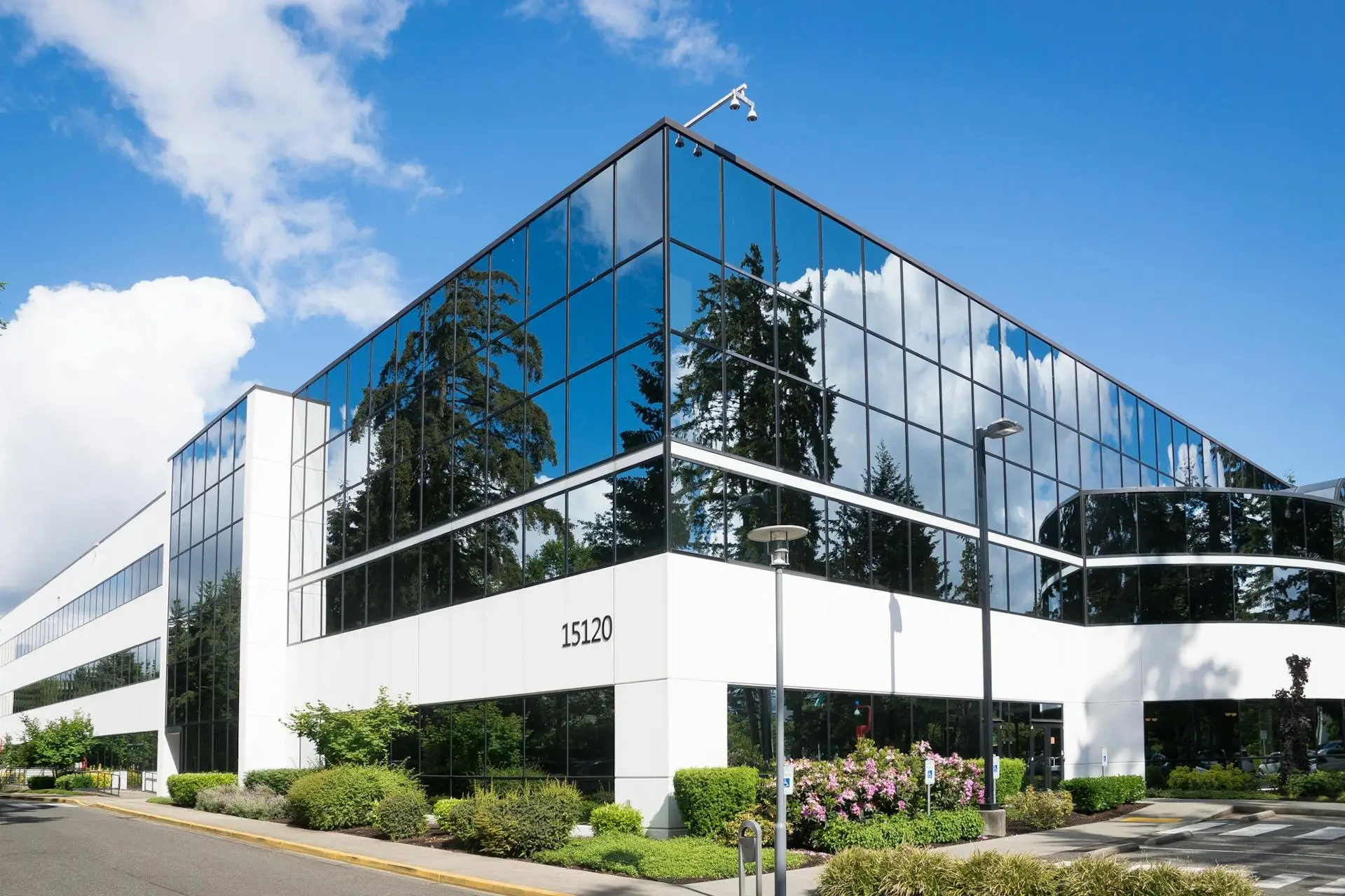 White commercial building with large windows