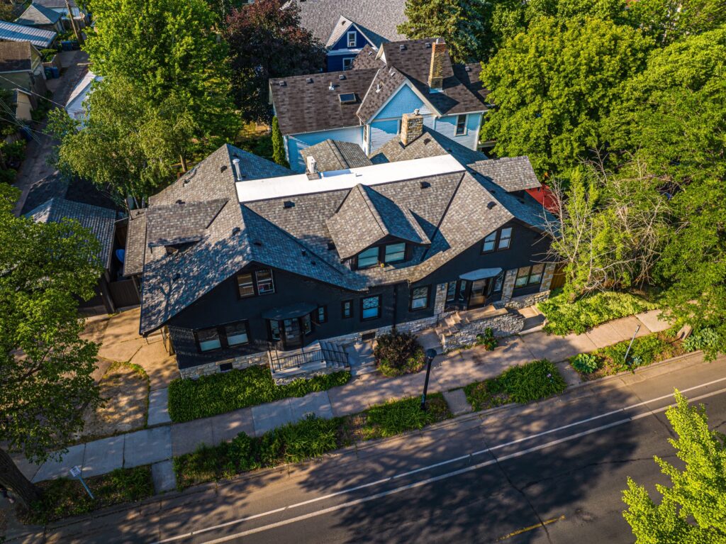 Aerial view showing an urban cottage's roofing