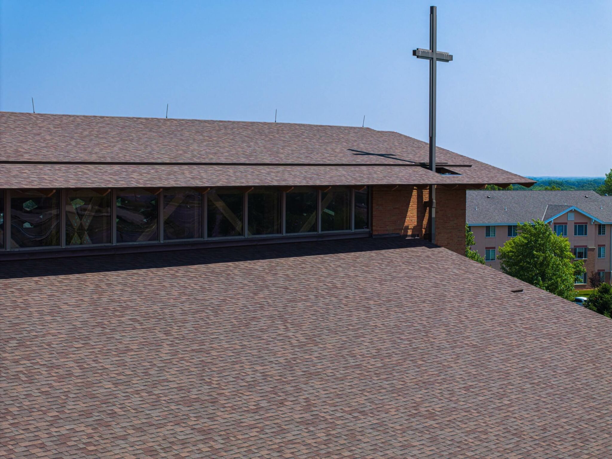 Rooftop view showing the cross atop a church