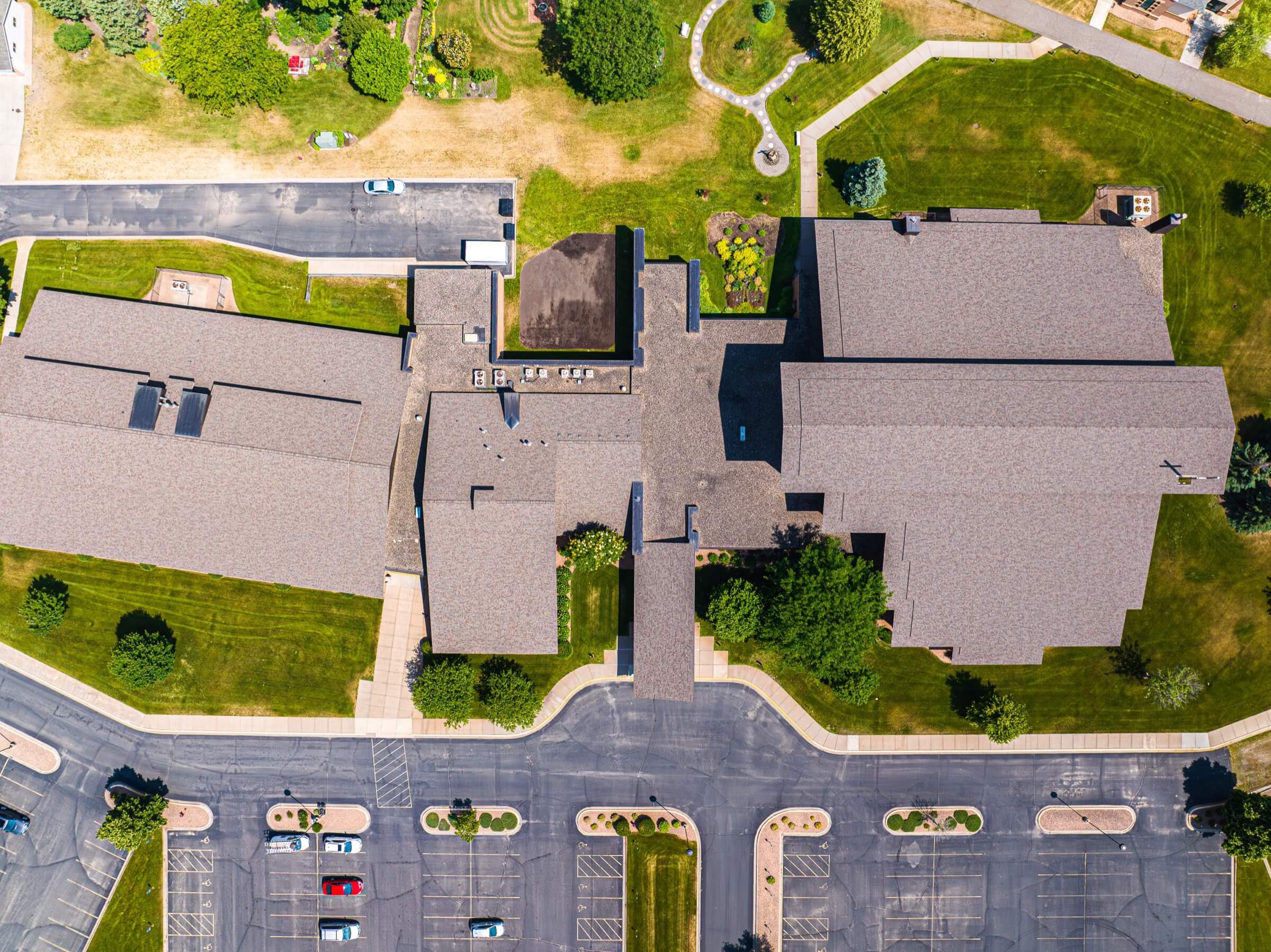 Aerial view looking down over the roof of a church