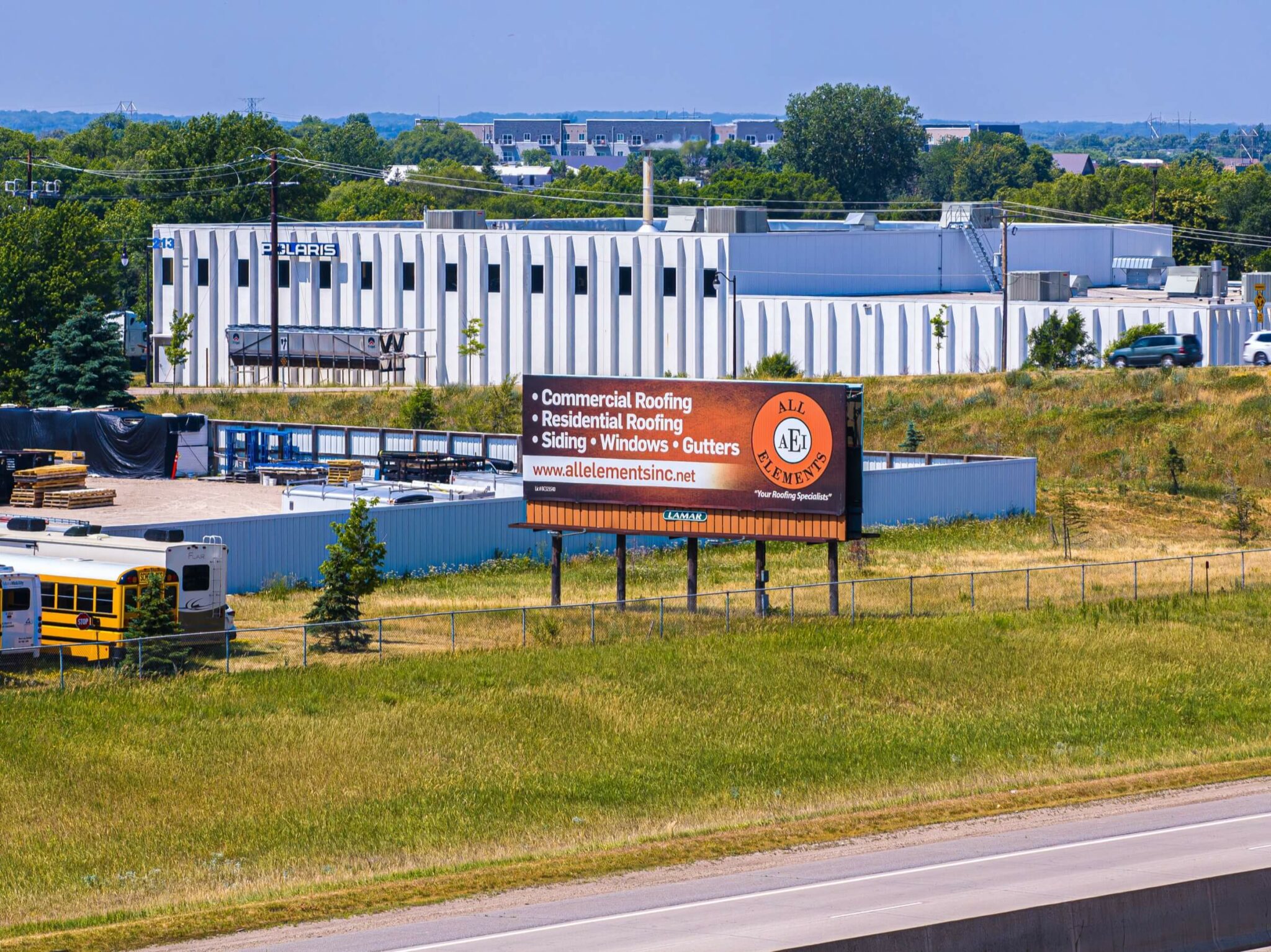 All Elements Inc billboard ad viewed along a highway