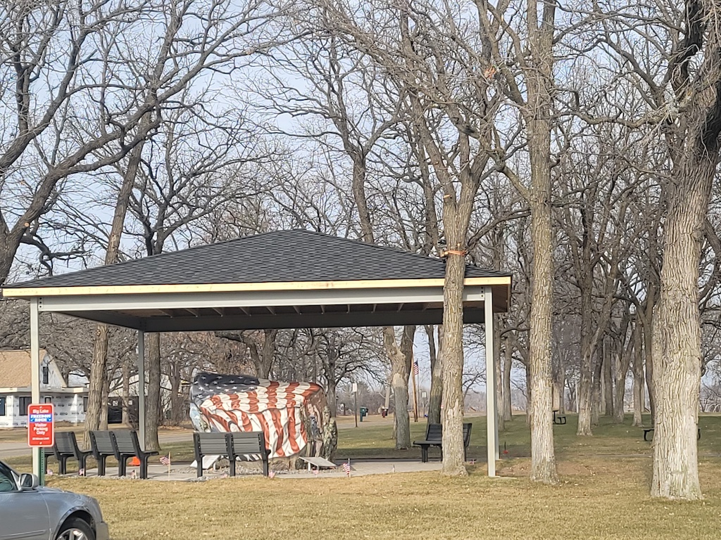 Freedom Rock Monument in Big Lake with shingled roof.